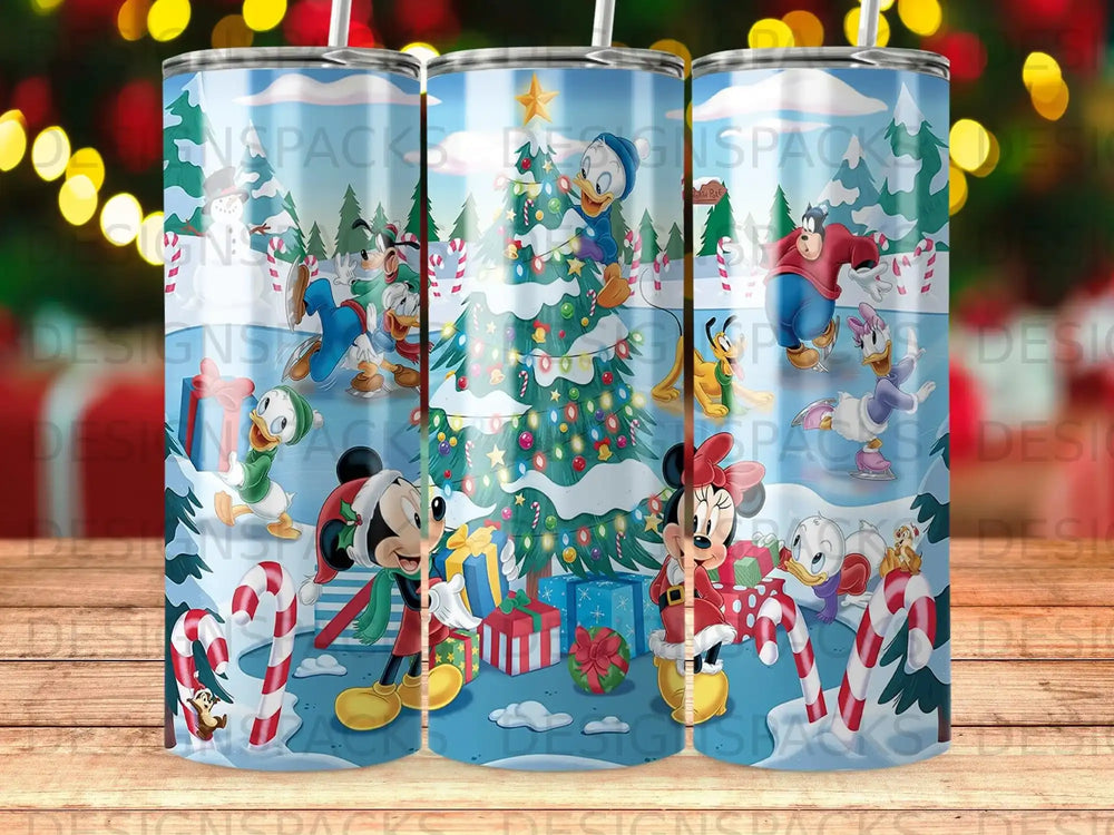 Christmas tumbler with Mickey Mouse, Minnie Mouse, Donald Duck, and Goofy decorating a tree.