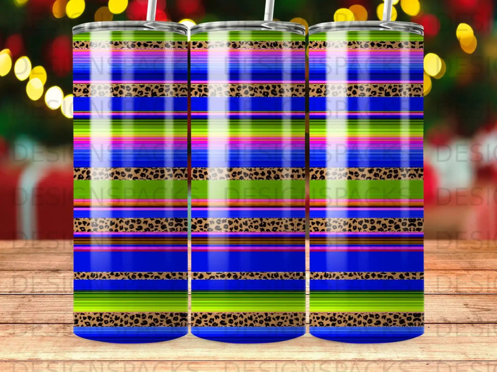 Tumbler with colorful stripes, leopard print, and subtle bokeh background.