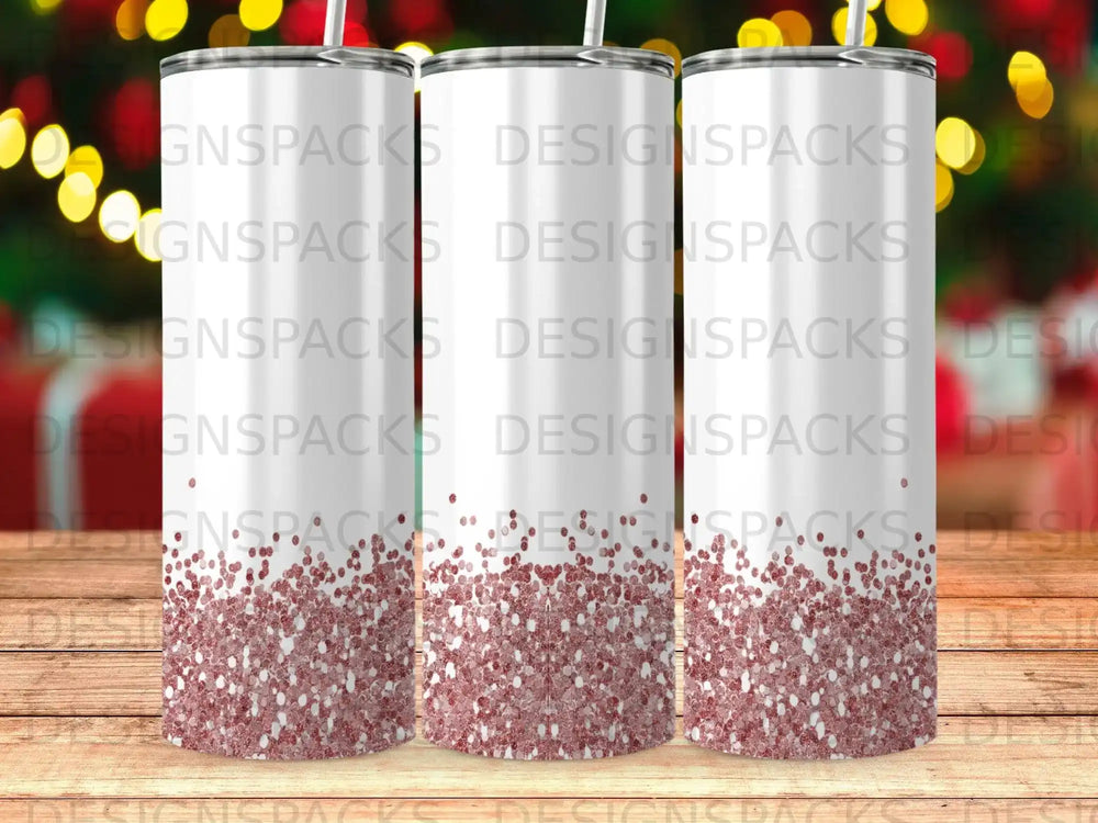 Three tumblers with glitter and "DESIGNSPACKS" repeating pattern.