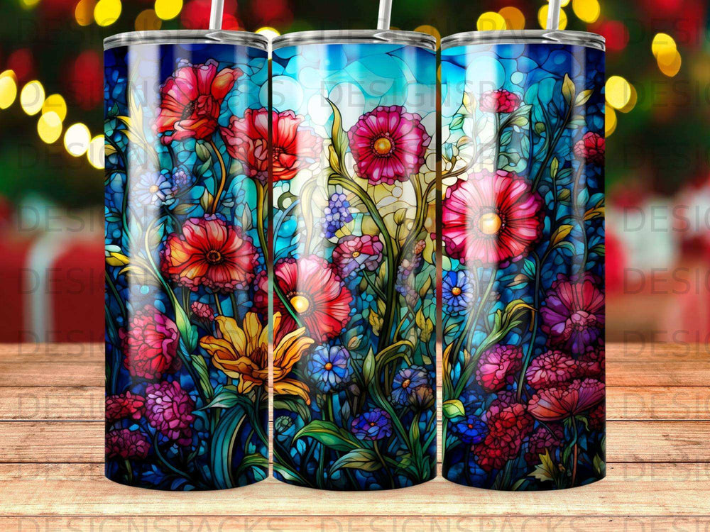Stained glass floral pattern tumbler with blue and red flowers.
