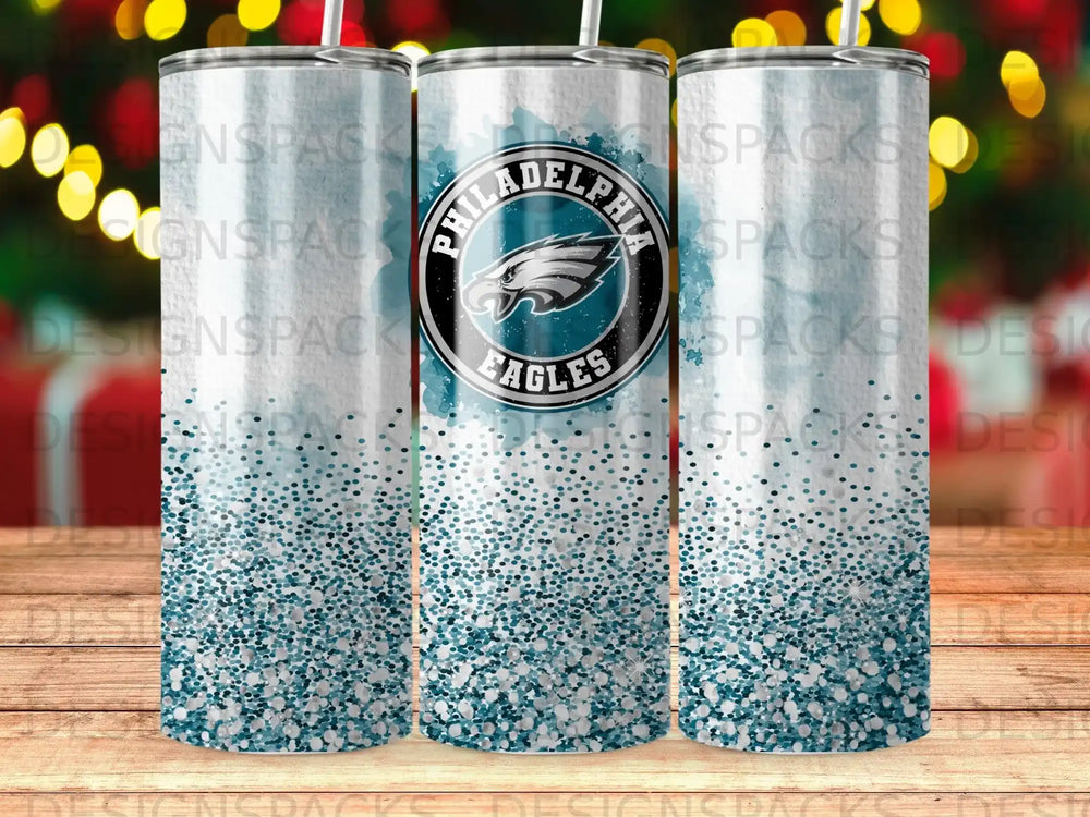 Philadelphia Eagles logo on a glittery blue ombre tumbler.