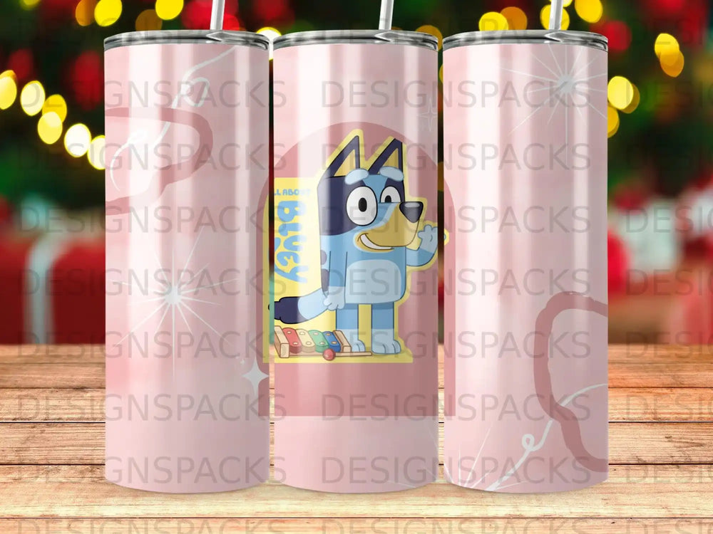 Bluey character on a pink tumbler with repeating "DESIGNSPACKS" watermark.