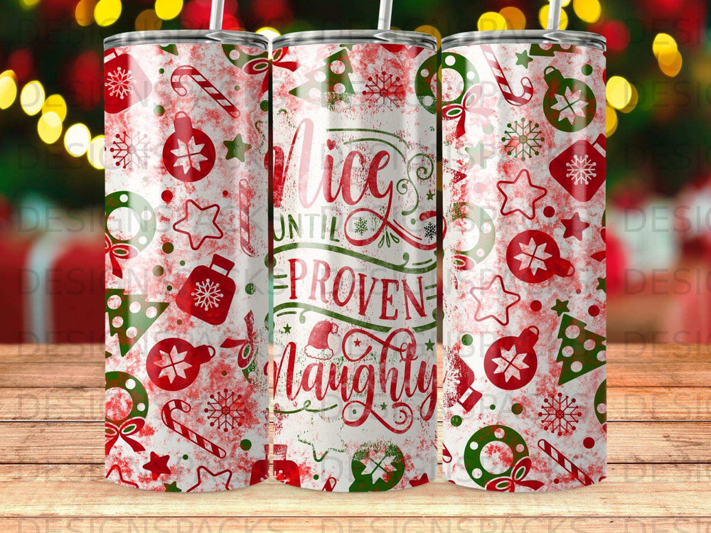Three tumblers with a red and white candy cane and Christmas pattern.
