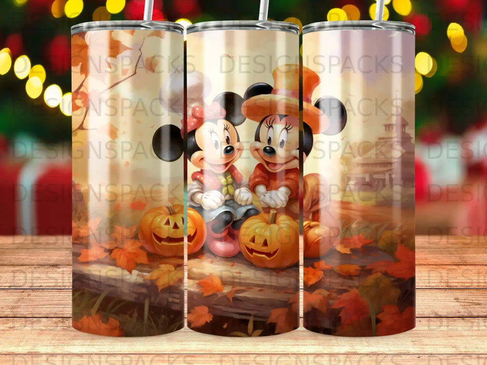 Mickey and Minnie Mouse sit with pumpkins and autumn leaves.