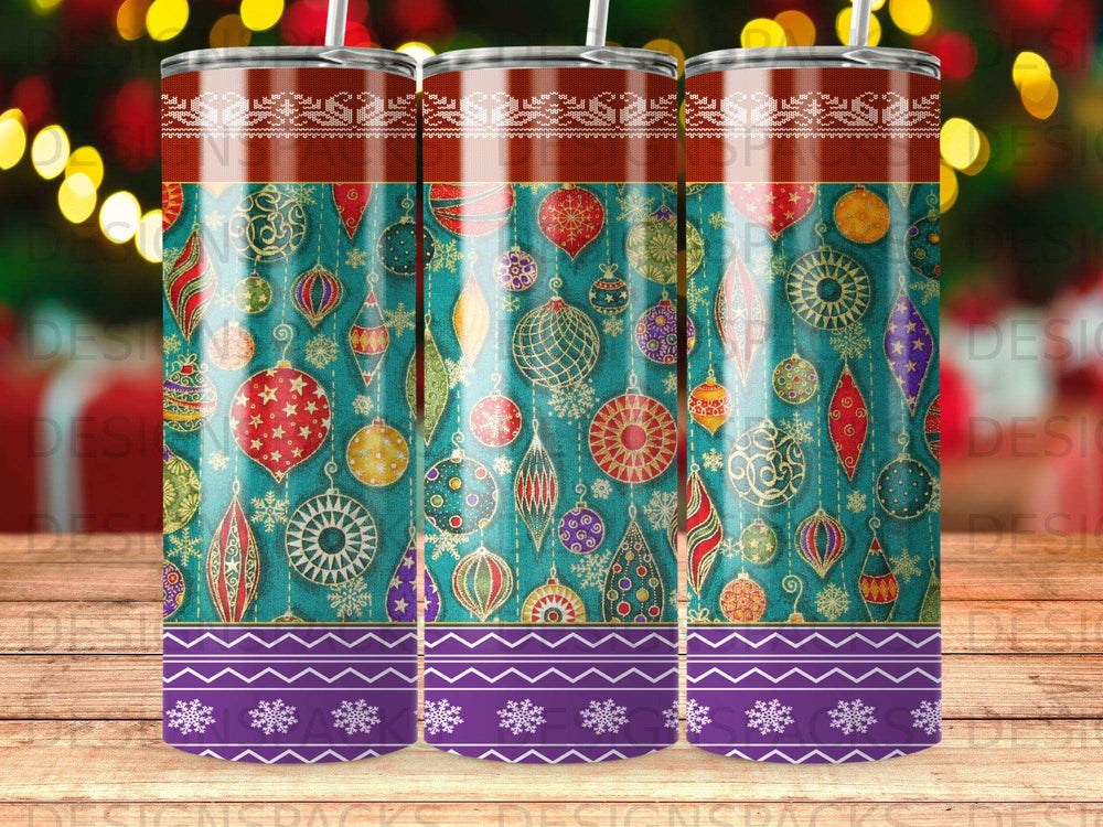 Three tumblers with a turquoise background featuring holiday ornaments and a purple striped bottom.
