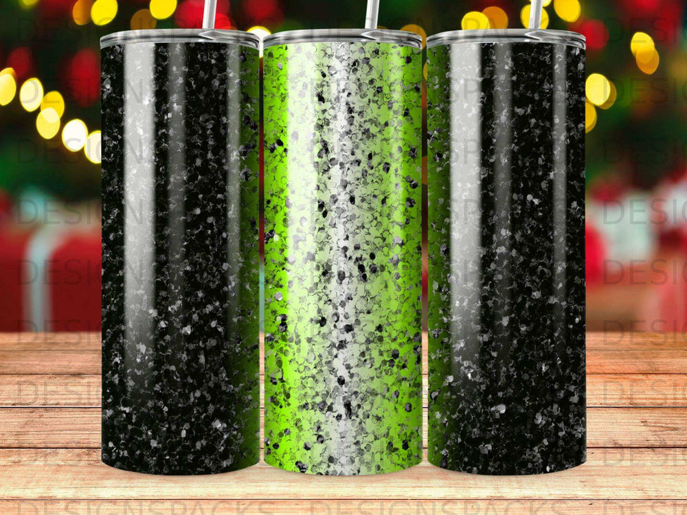 Three glitter tumblers: two black, one lime green, with blurred bokeh background.