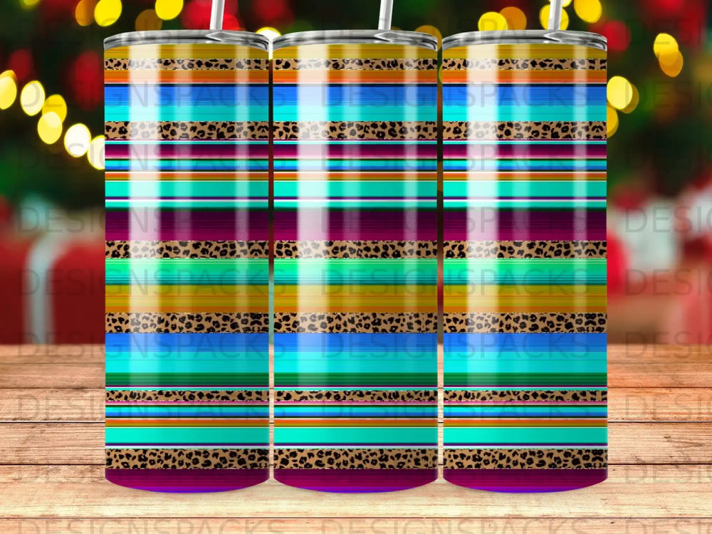 Striped tumbler with leopard print accents and bokeh background.