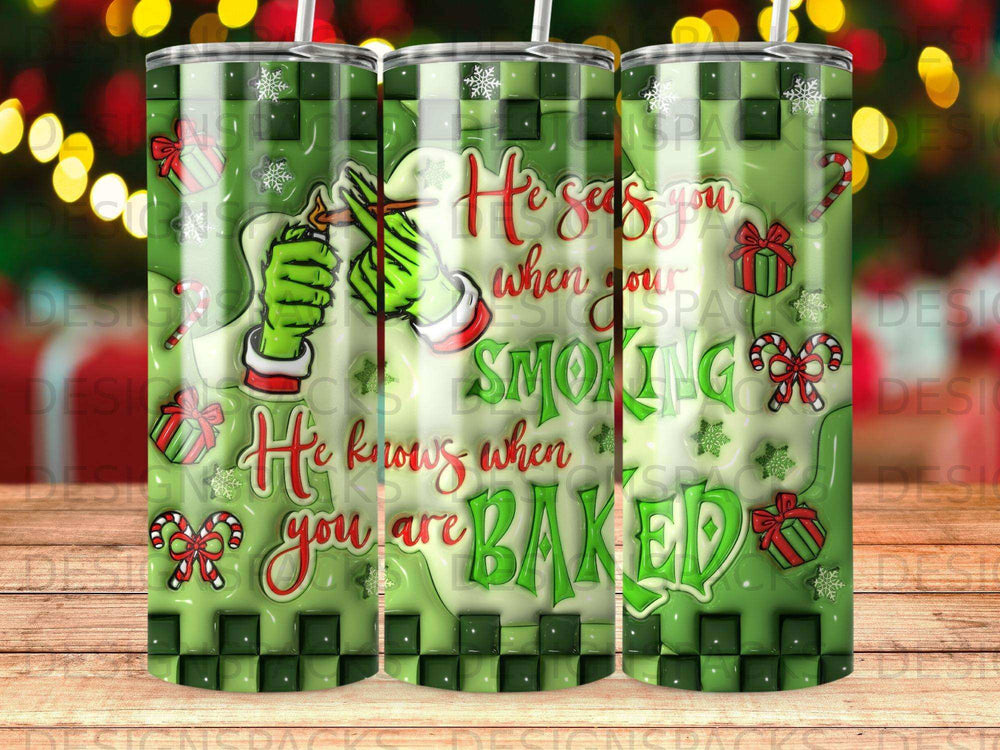 Tumbler with green Christmas background and text "He knows when you are BAKED".