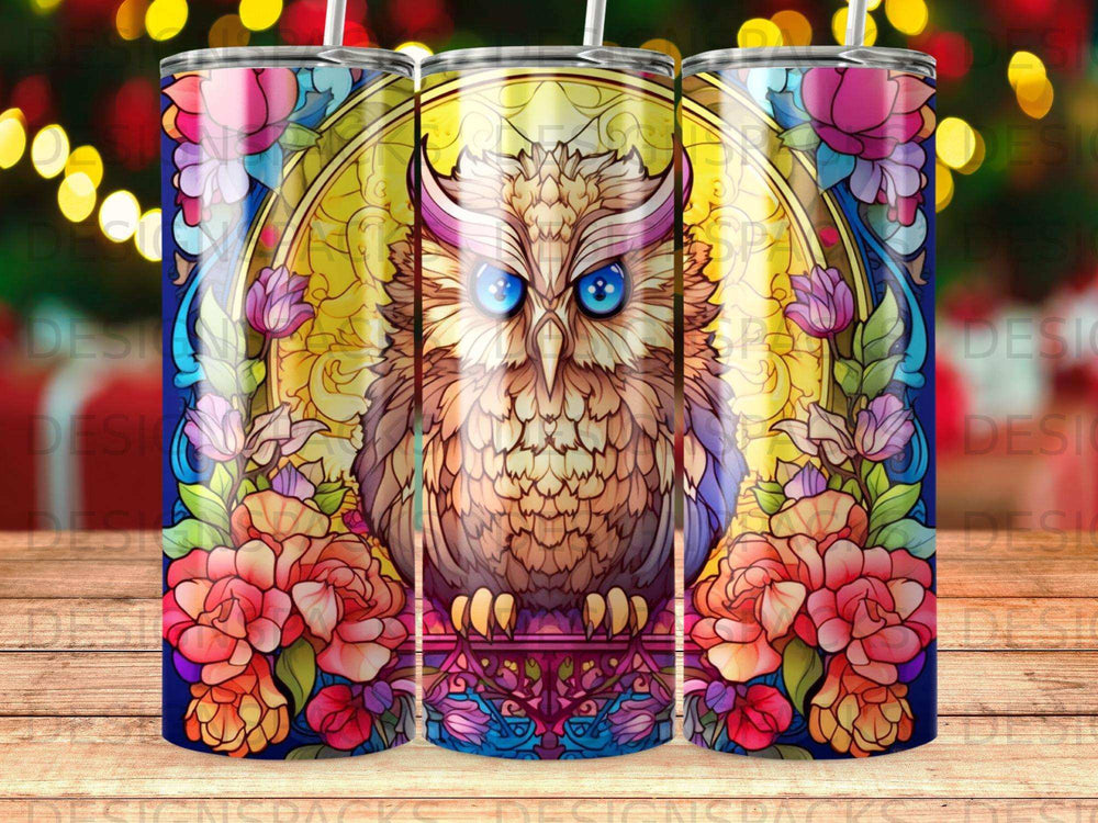 Detailed illustration of an owl with vibrant floral borders on a tumbler.