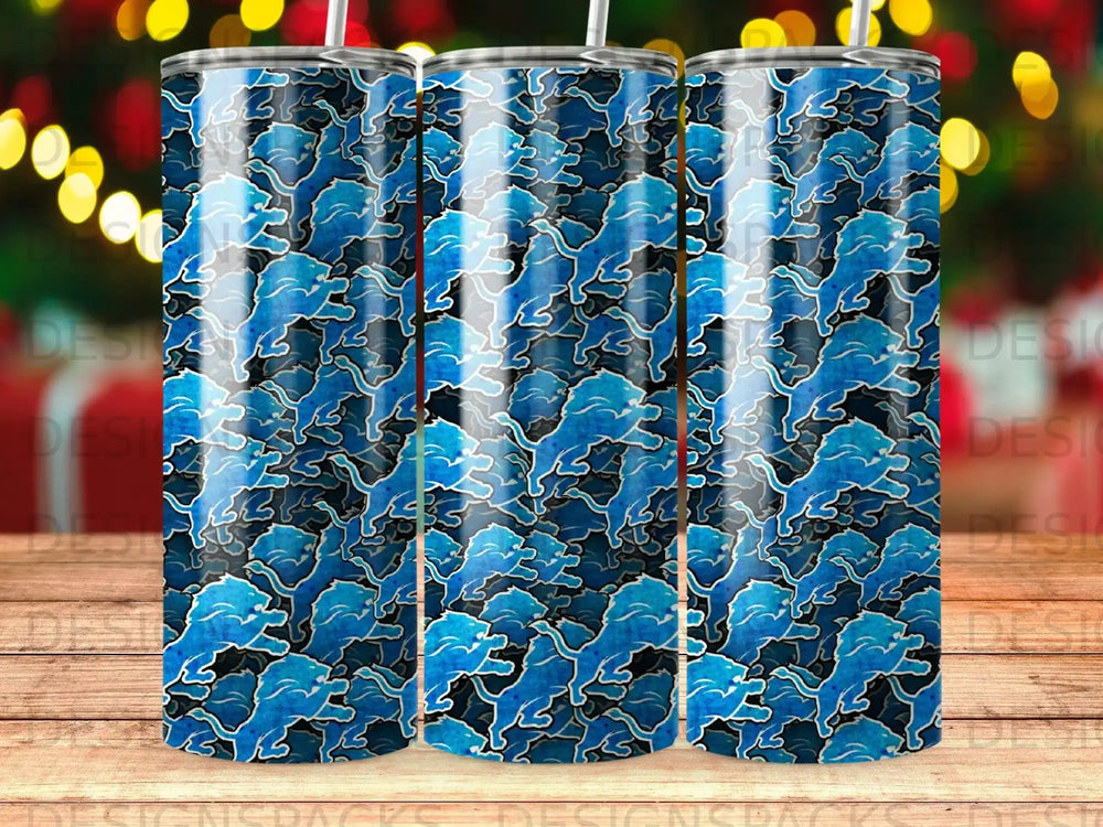 Blue lions pattern on three tumblers with festive bokeh background.