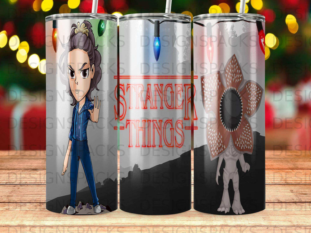 Stranger Things tumbler with Demogorgon and Eleven characters.