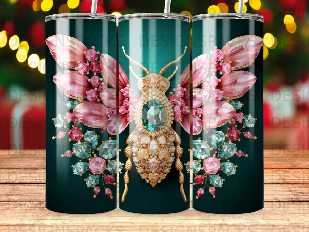 Jeweled butterfly with pink and blue gems on dark green tumbler.