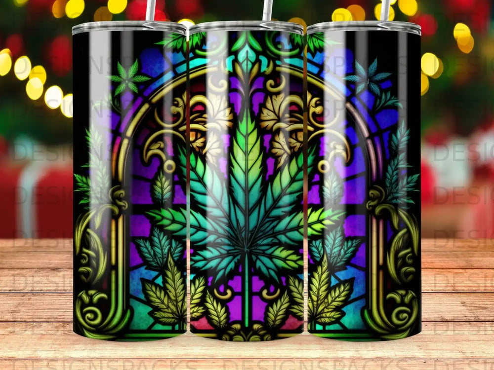 Stained glass pattern with a cannabis leaf and ornate golden trim.