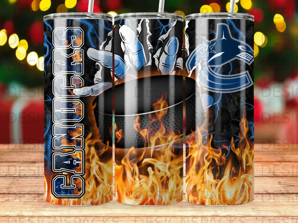 Vancouver Canucks hockey team logo on a fiery tumbler with lightning.