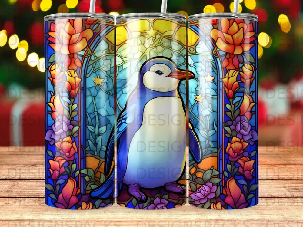 Blue penguin on stained glass background with floral border and bokeh lights.