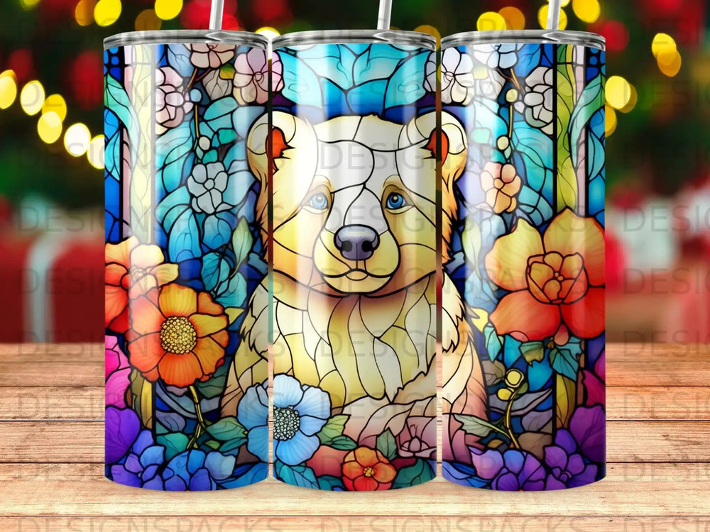 Stained glass bear with blue eyes surrounded by colorful flowers.