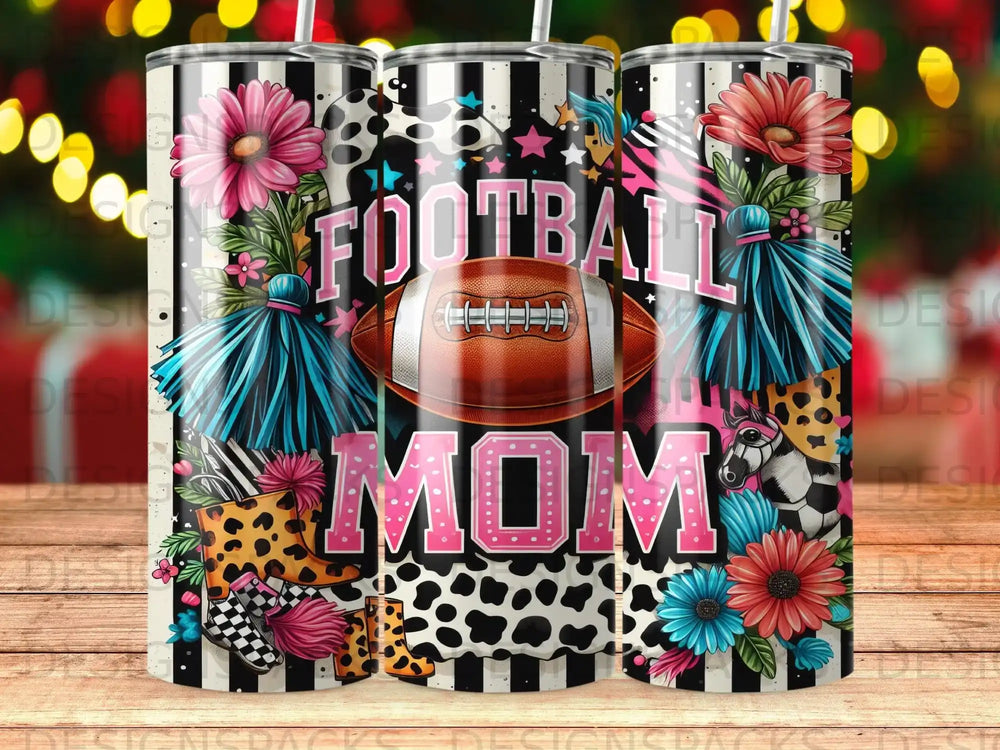 Football Mom tumbler with flowers, stars, and cow print accents.