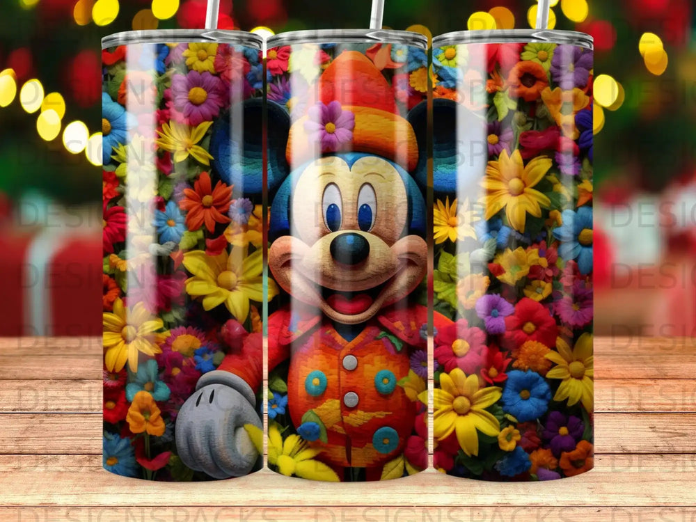 Mickey Mouse in a floral pattern on a cylindrical tumbler.
