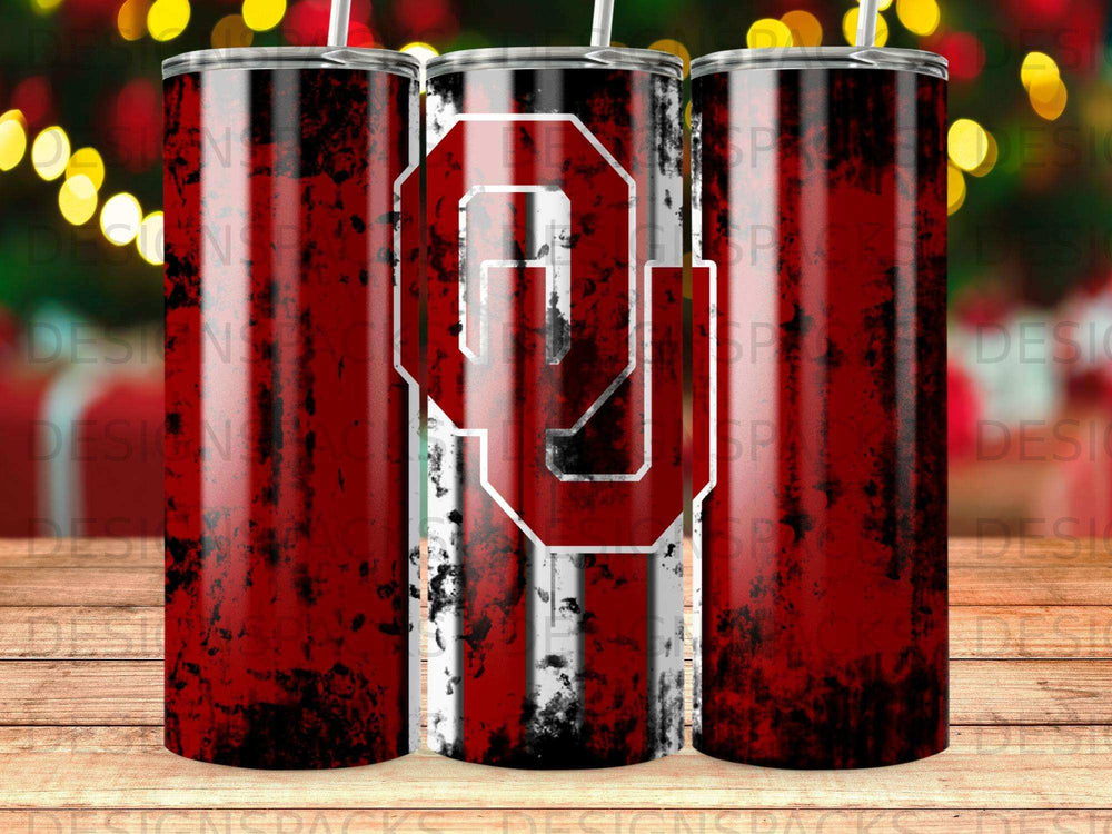 Oklahoma Sooners OU logo on distressed red and white striped tumbler.
