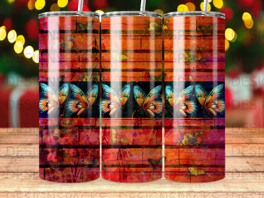 Three tumblers with a vibrant butterfly and wood plank pattern.