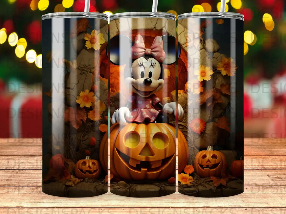 Minnie Mouse sits on a jack-o'-lantern with pumpkins and autumn leaves.