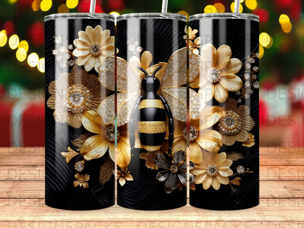 Bee and floral design on a black textured tumbler with gold accents.