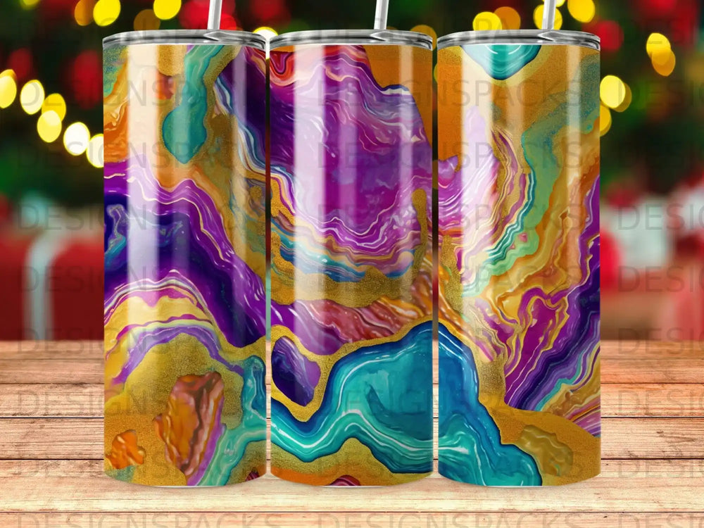 Tumbler with abstract gold, purple, and teal marbling design.