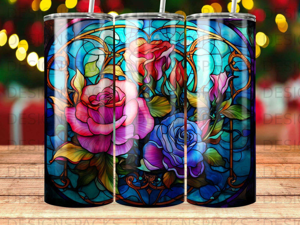 Stained glass design of pink and blue roses with a festive, blurred background.