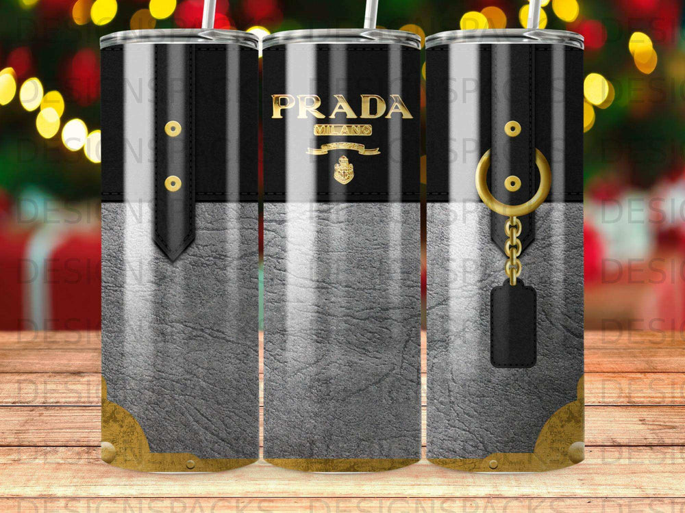 Prada Milano tumbler with black strap and gold hardware accents.