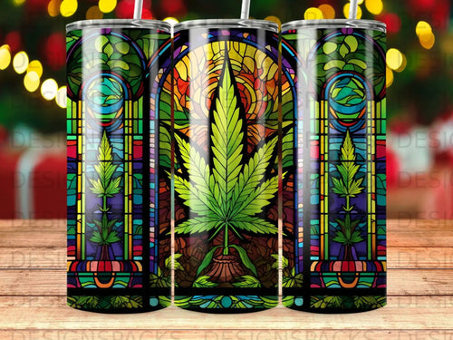 Stained glass tumbler with a prominent cannabis leaf design.