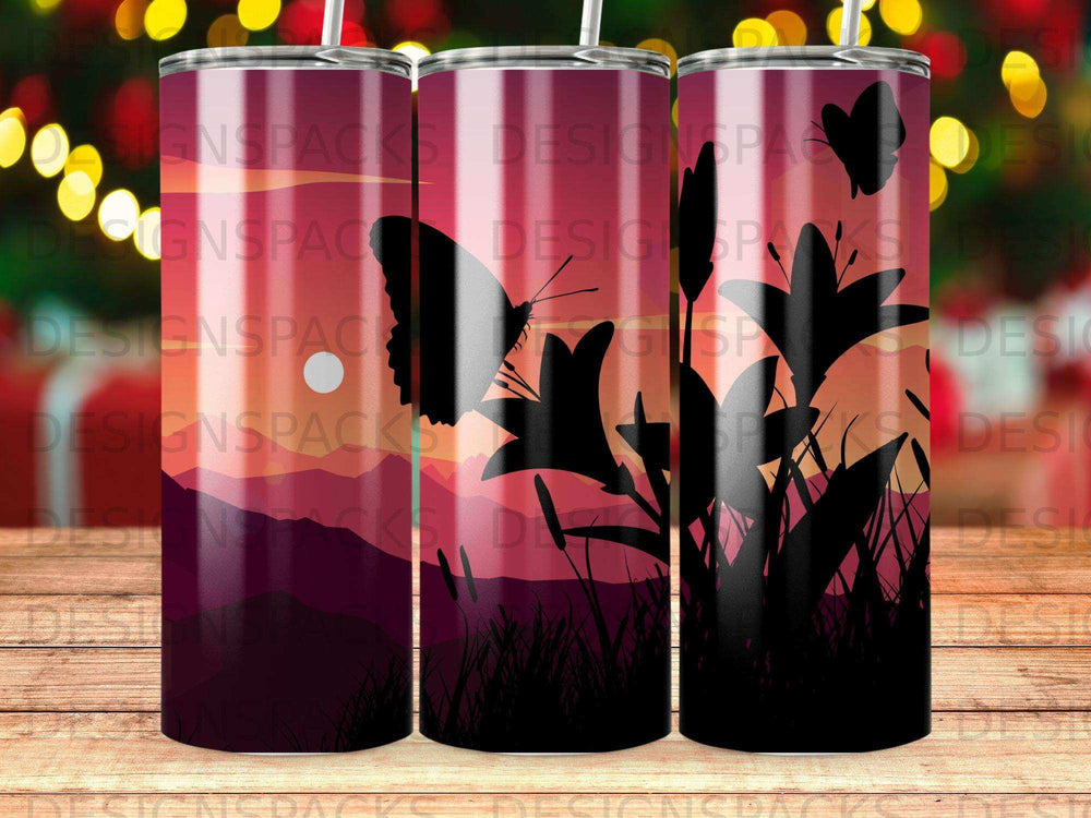 Three tumblers featuring a sunset silhouette with butterflies and lilies.