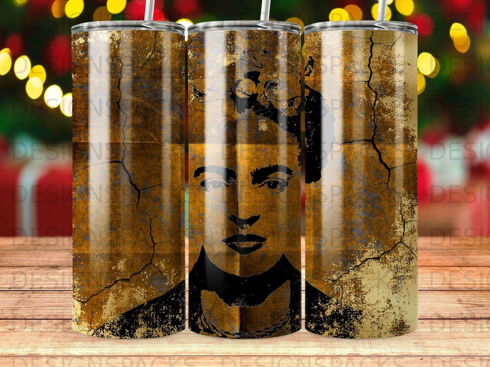 Frida Kahlo portrait on a cracked, textured tumbler with blurred festive lights.