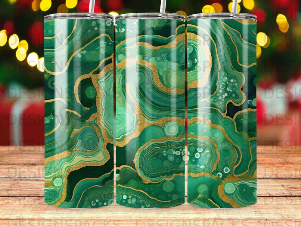 Green and gold agate pattern on a tumbler with a straw.