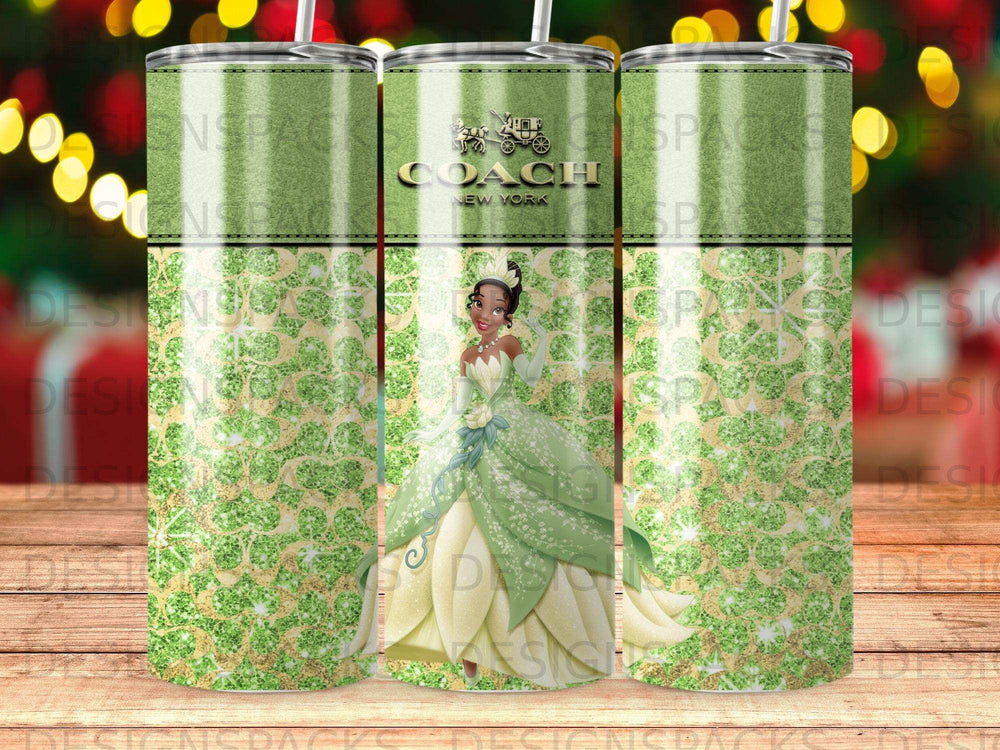 Coach New York Tiana tumbler with green floral pattern and glitter accents.