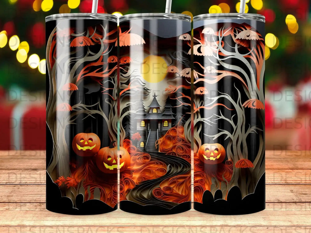 Halloween tumbler with haunted house, pumpkins, and spooky trees.