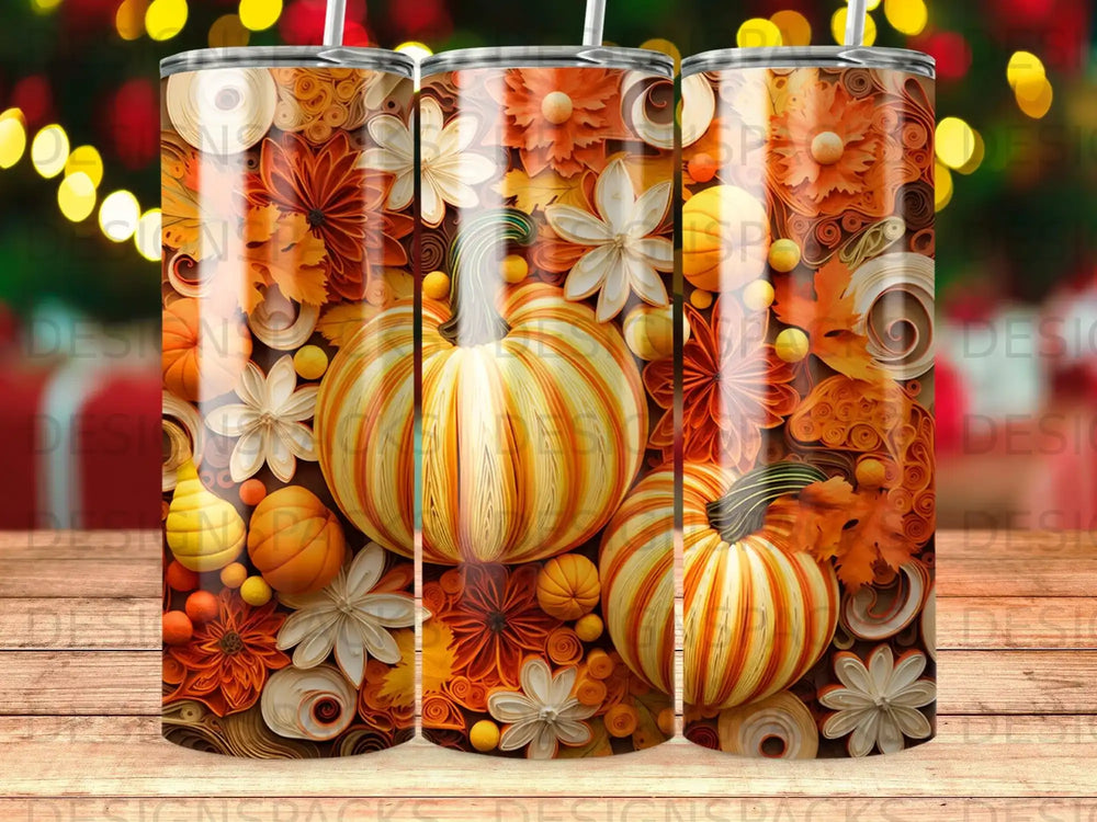 Three tumblers featuring pumpkins, fall leaves, and floral cutouts.