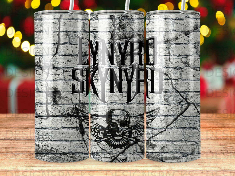 Lynyrd Skynyrd logo with winged skull on distressed brick background.
