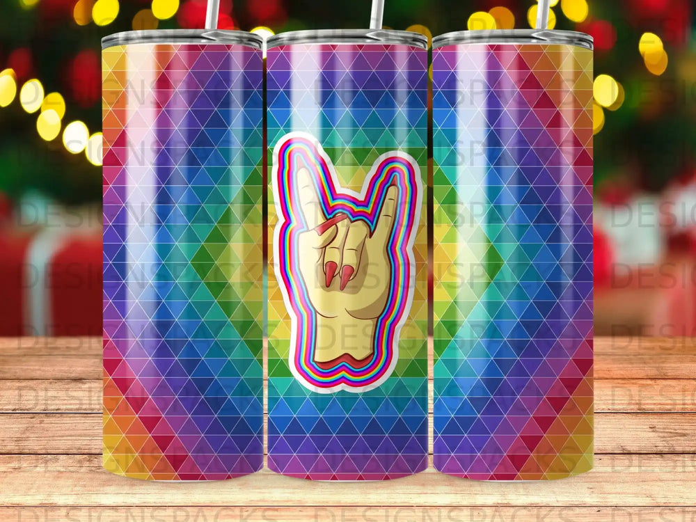 Tumbler with rainbow geometric pattern and peace sign hand.