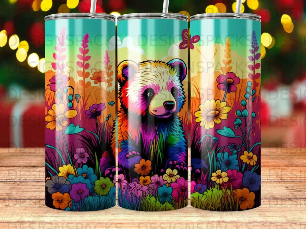 Colorful bear sitting in a vibrant field of flowers.