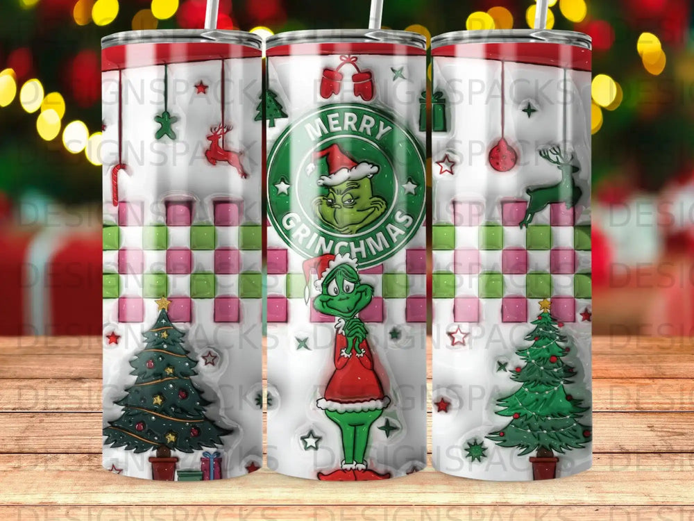 Grinch Christmas tumbler with plaid background and holiday trees.