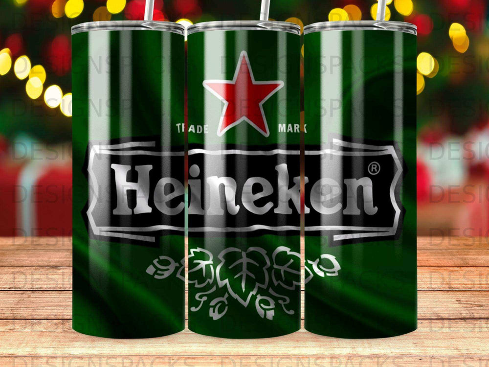 Heineken logo on green patterned cylindrical tumbler with three tumblers visible.
