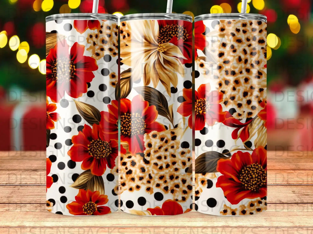 Floral and leopard print tumbler with polka dots on a wooden surface.