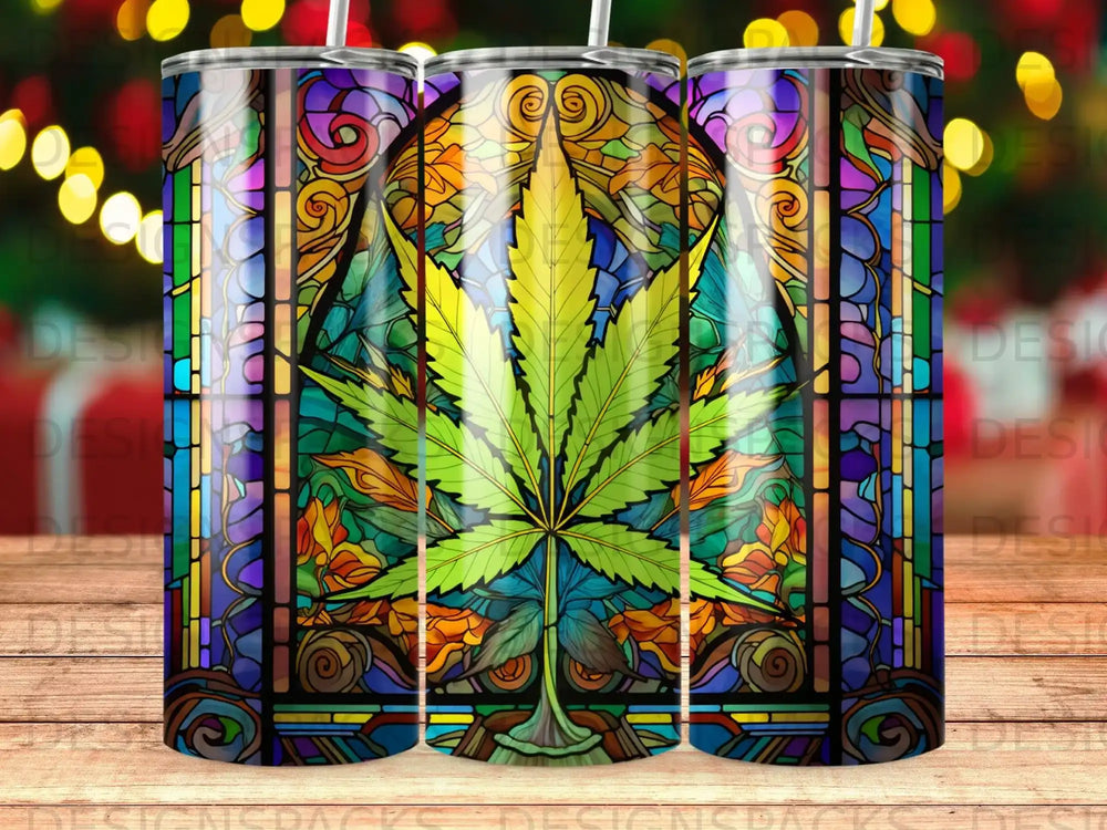 Stained glass tumbler with a large green cannabis leaf design.