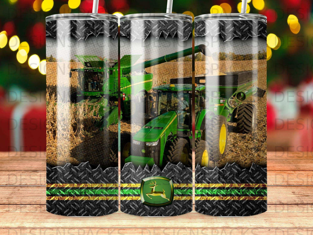John Deere combine and tractor harvesting corn in a field.