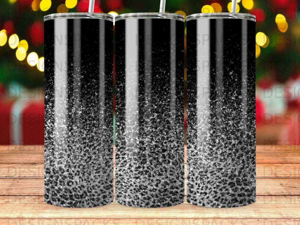 Black tumbler with silver glitter gradient design.