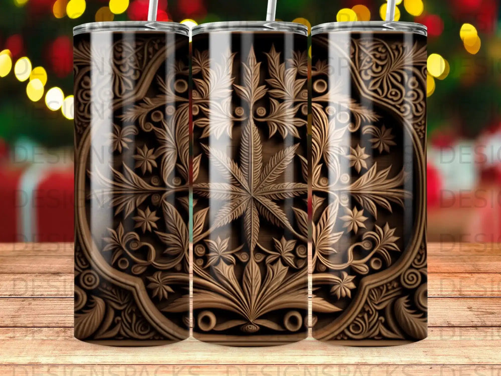 Three skinny tumblers with a wood-grain, ornate floral and leaf design.