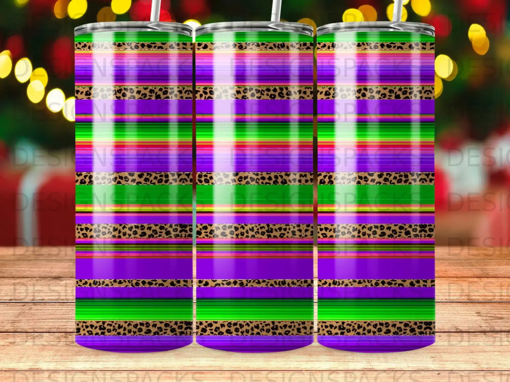 Striped tumbler wrap with purple, green, and leopard print bands.