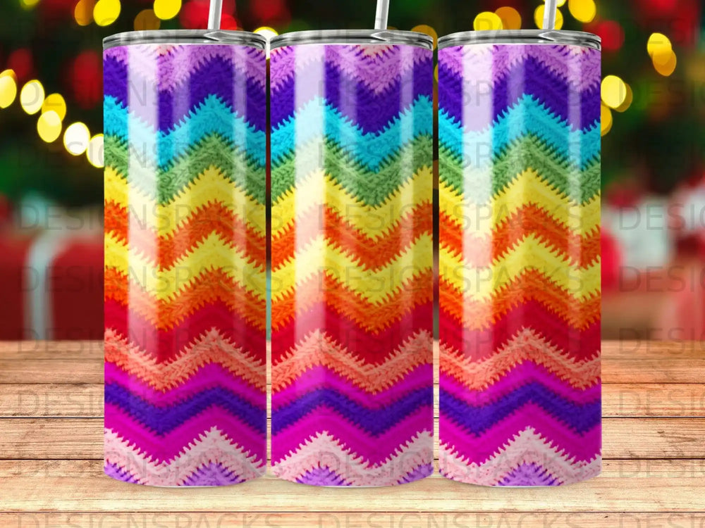 Zigzag rainbow pattern on a skinny tumbler with a straw.