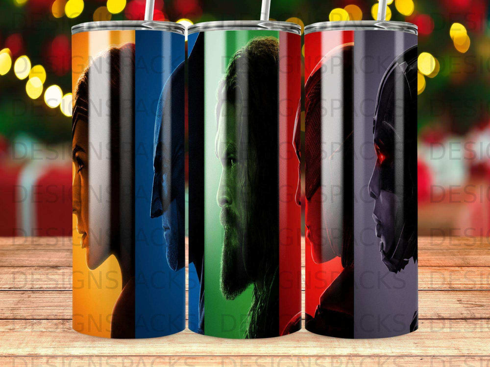Three tumblers with superhero profiles, Avengers logos, and holiday lights.