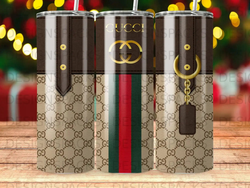 Gucci print tumbler with gold chain and green stripe.
